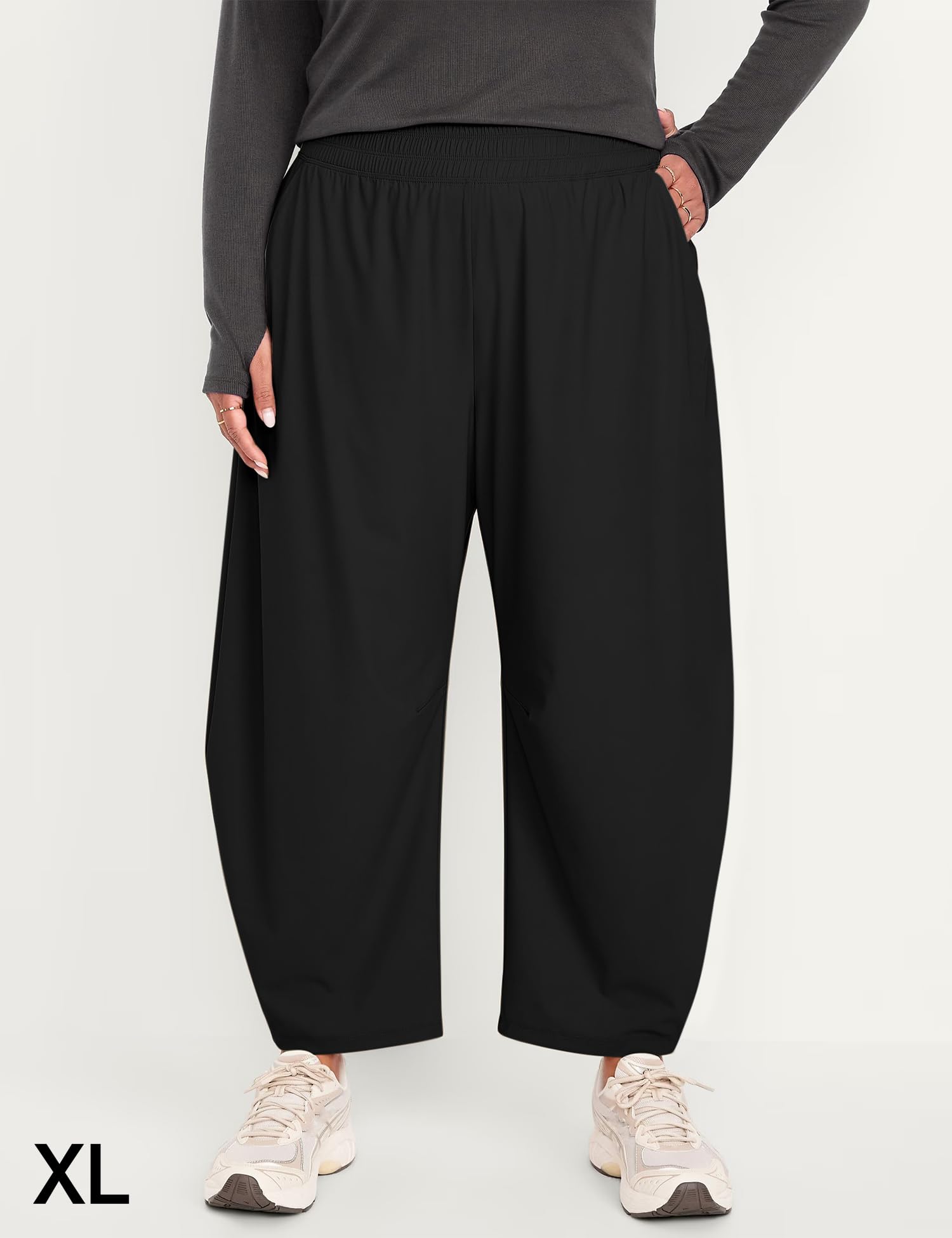 Ugerlov high-waisted barrel pants pair with crop tops for versatile outfits.