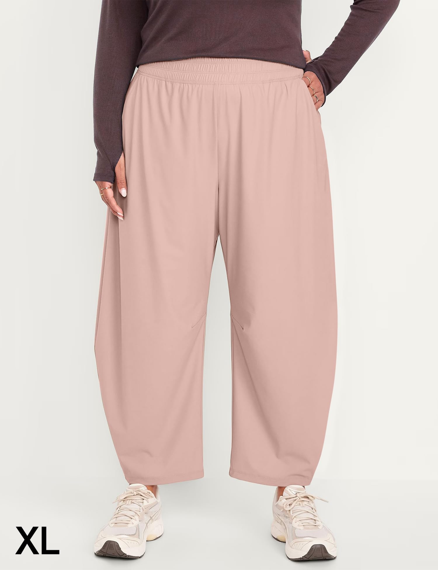 Ugerlov pink lightweight hiking pants on model to highlight color and fit