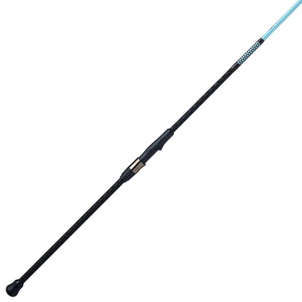 Ugly Stik 9ft carbon surf rod in hand shows sturdy balance and build.