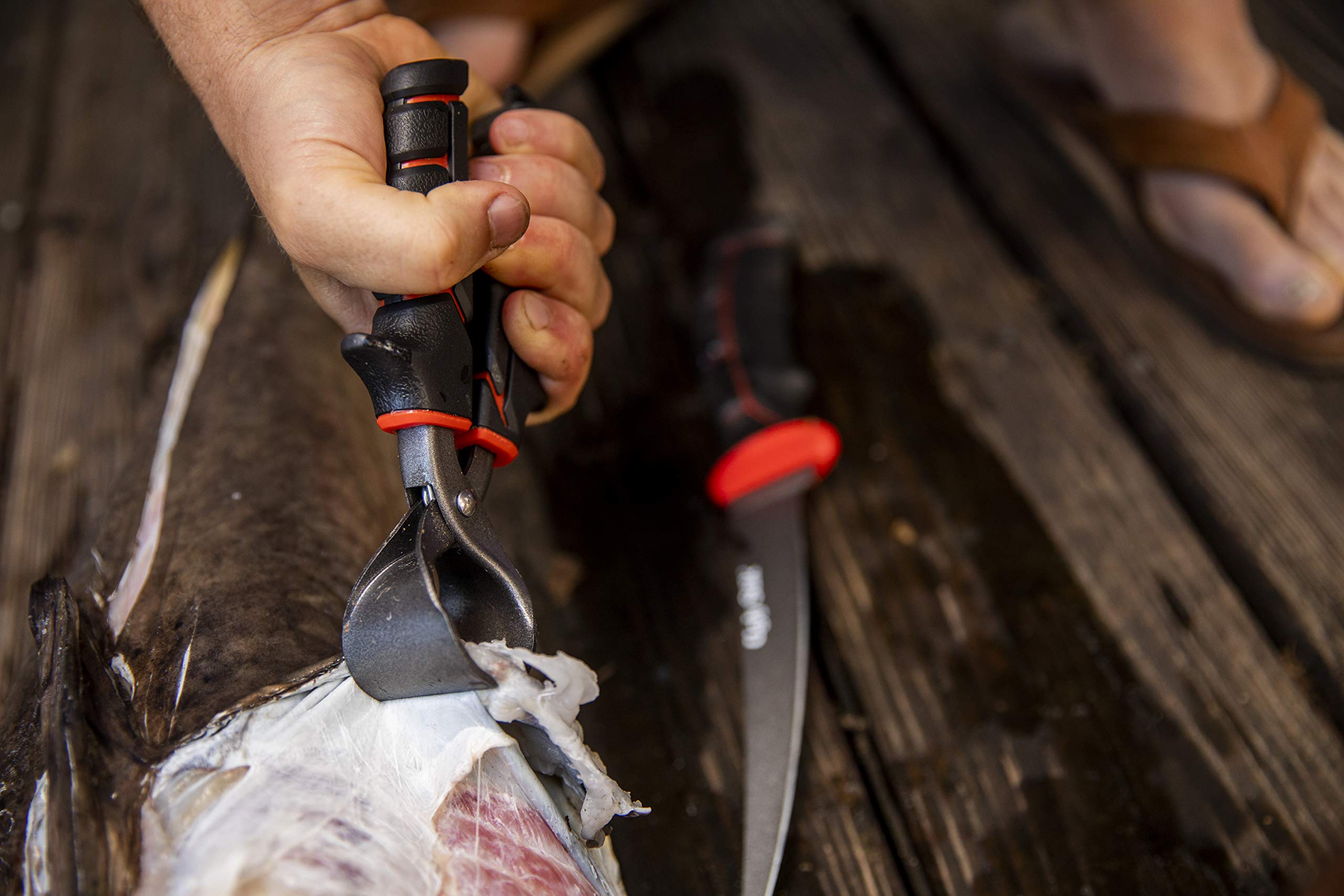 36-inch coiled lanyard attached to Ugly Stik fishing tool