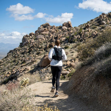 Ultimate Direction Adventure Vesta trekking pole attachments for versatile gear carry.