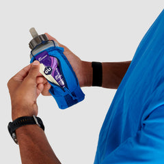 Ultimate Direction Clutch with secure zip pocket for valuables during workouts.