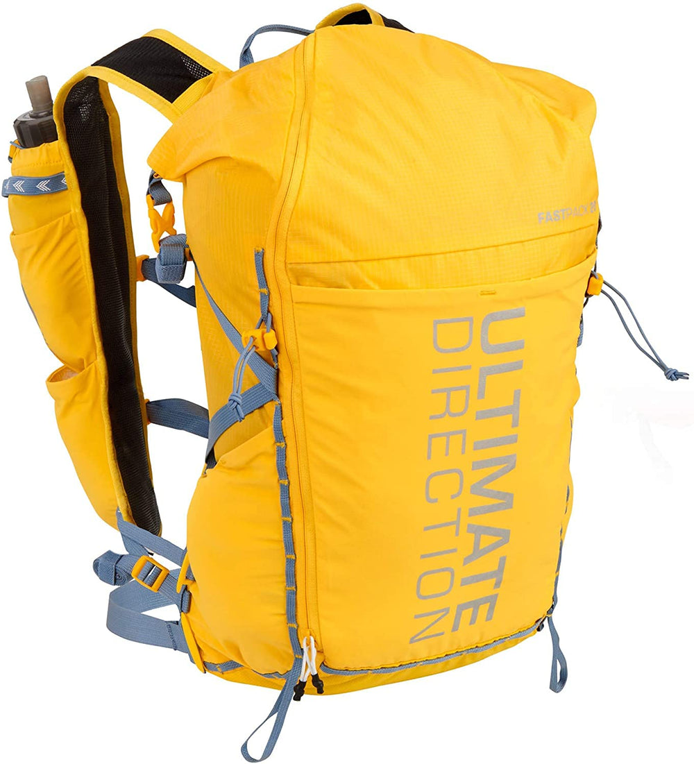 Ultimate Direction Fastpack 20L front view with harness pockets enabling quick hydration on trails