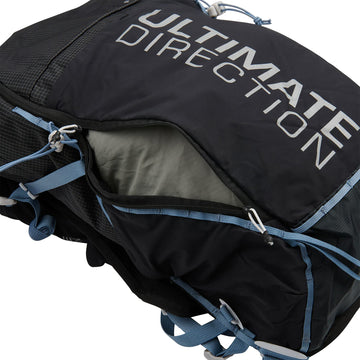 Ultimate Direction Fastpack 20L roll-top closure showing expandable storage