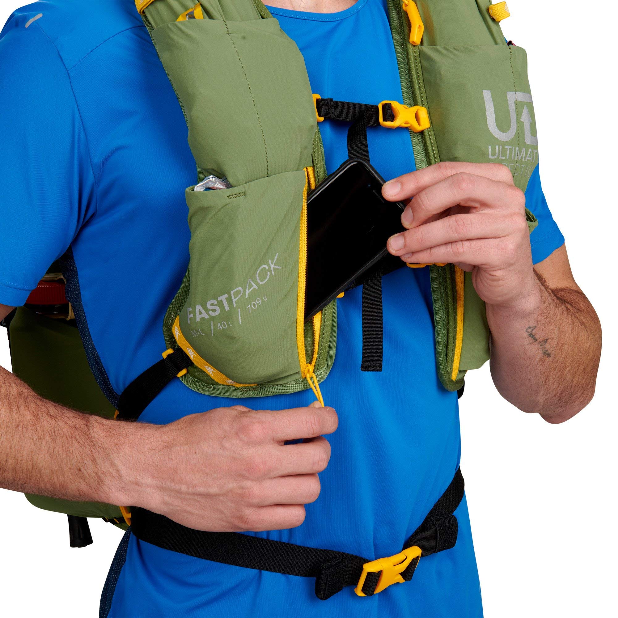 Ultimate Direction Fastpack 40 Spruce water bottle pocket supports hydration on the go.