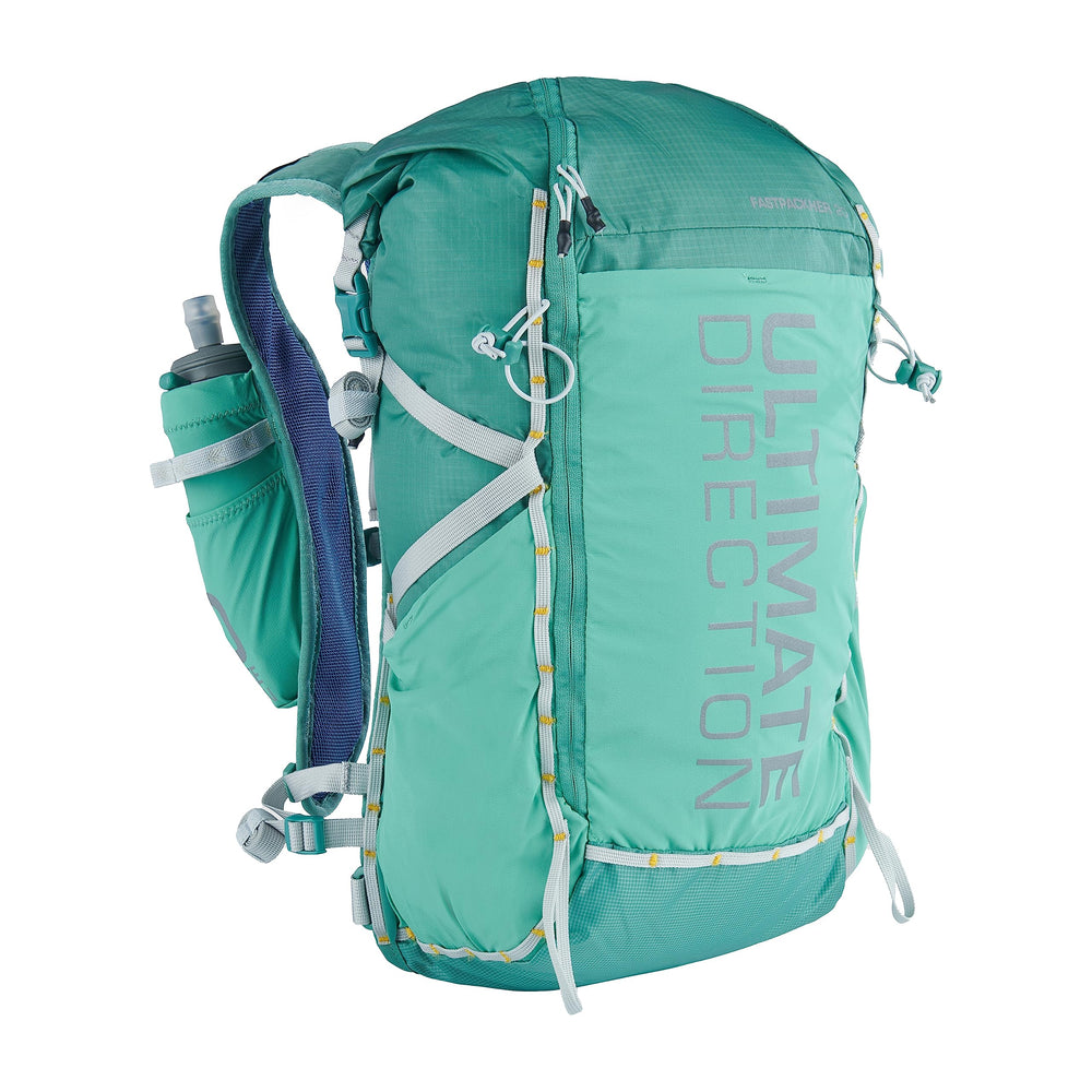 Ultimate Direction FastPackHer 20L backpack from the back, designed for women's fit and backcountry comfort.