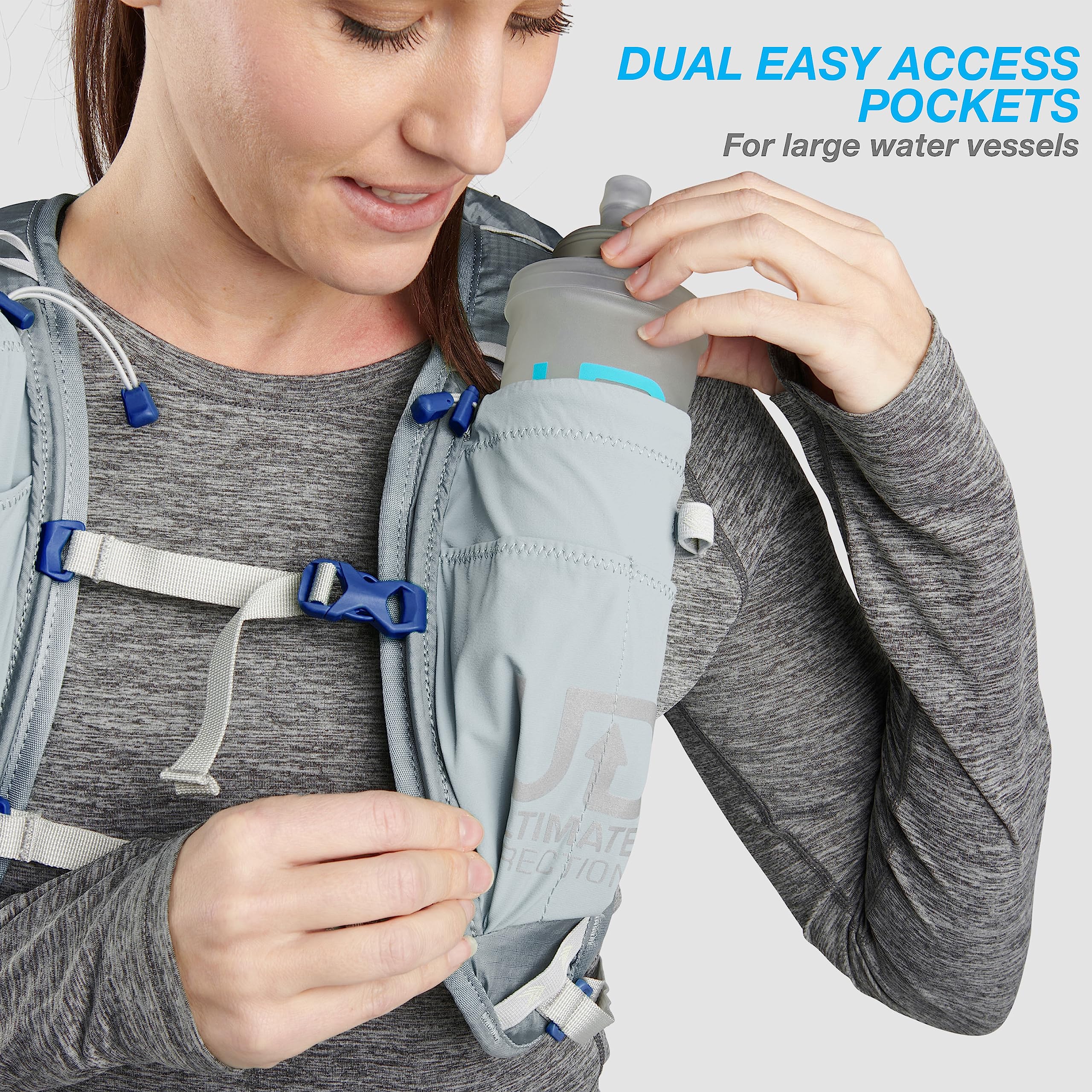 Ultimate Direction FastPackHer 20L dual water bottle pockets for easy hydration on the go