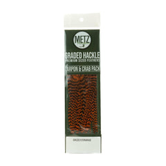 Umpqua Metz tarpon/crab hackle pack in grizzly orange for consistent tails and bushy collars.