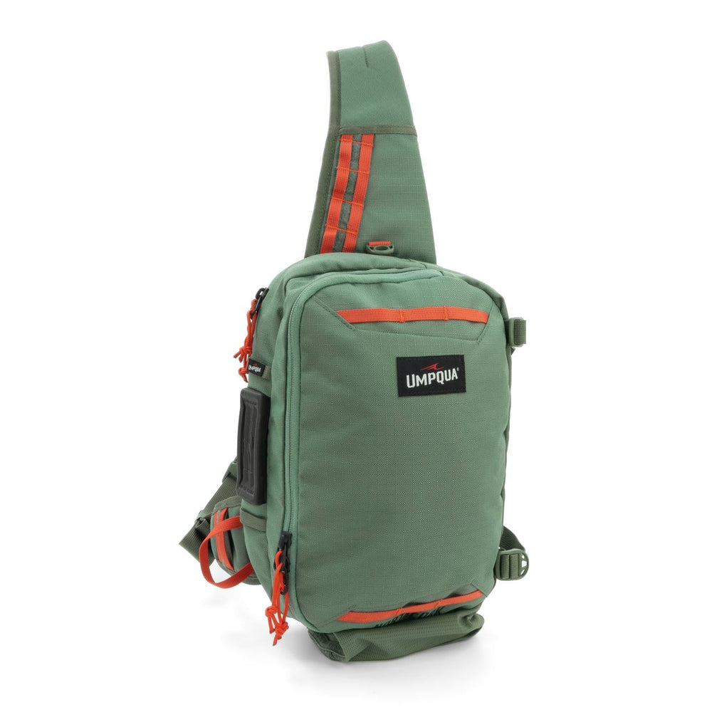 Umpqua Northfork Sling Pack Pine front view highlights roomy main compartment for four fly boxes.