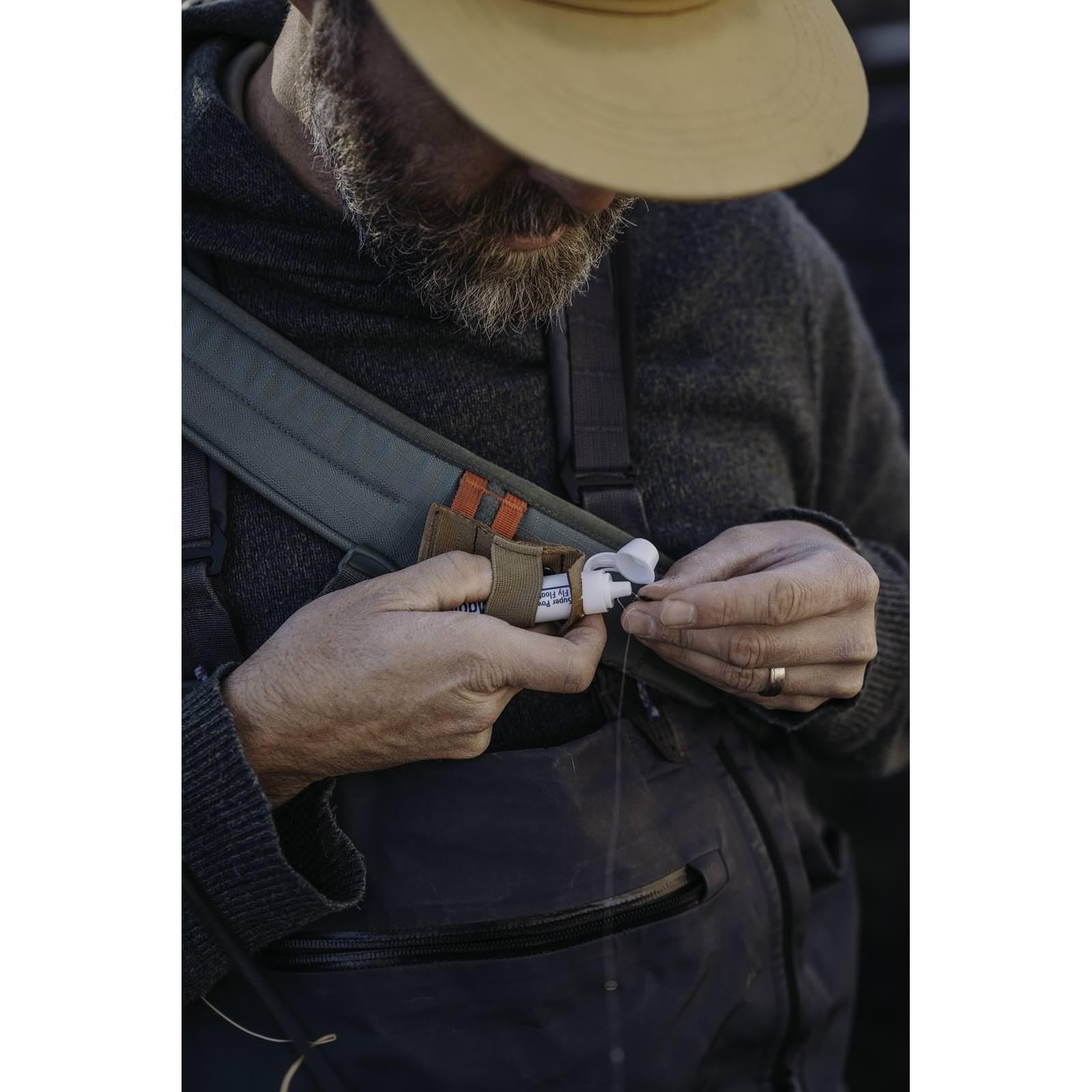 Angler wearing Northfork Waist Pack Pine on hip