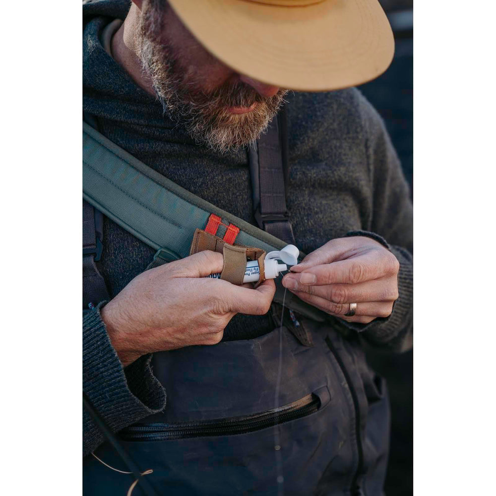 Angler wearing Northfork Waist Pack Pine on hip