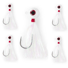 UNCLE MO'S UMT fluke bucktail jig with pearl white Mylar teaser attracts strikes.