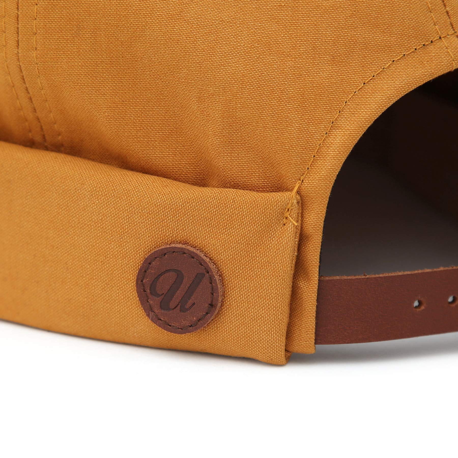 UnderCONTROL VNTG mustard cap brass buckle detail.