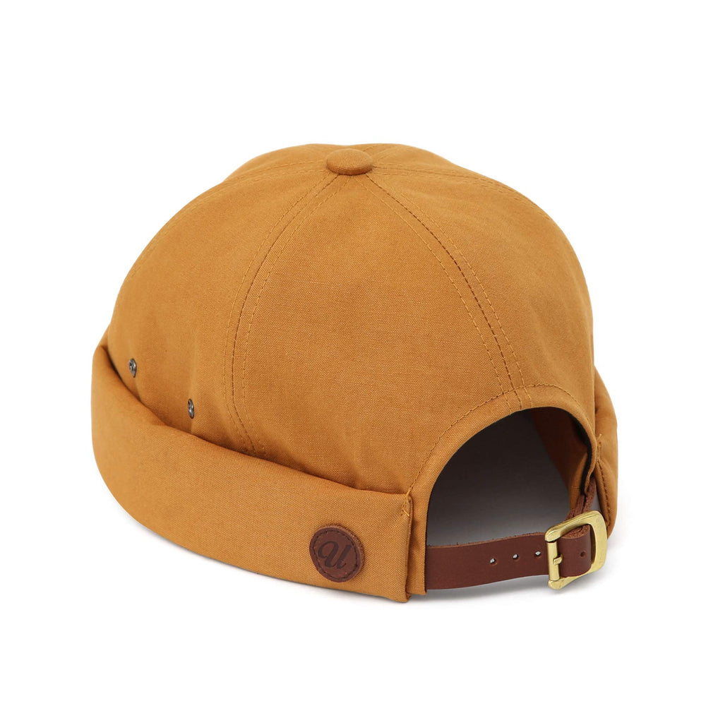 UnderCONTROL VNTG brimless cap mustard side profile with rolled cuff.