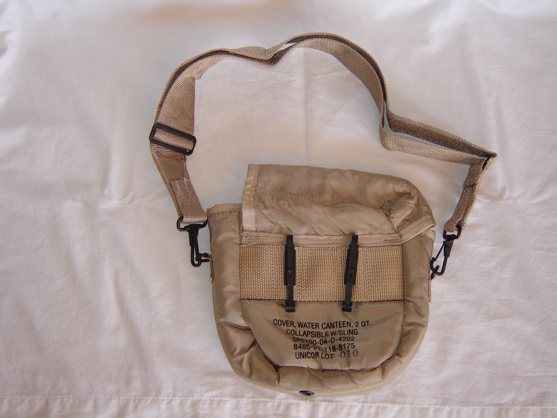 Unicor G.I. 2Qt canteen cover, Desert Tan, pocket view, convenient storage