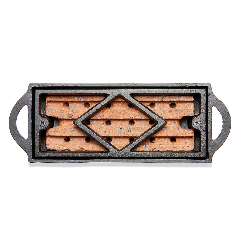 UniFlame Cast Iron Firestarter Tray, fully assembled, ready for quick lighting in your fireplace.