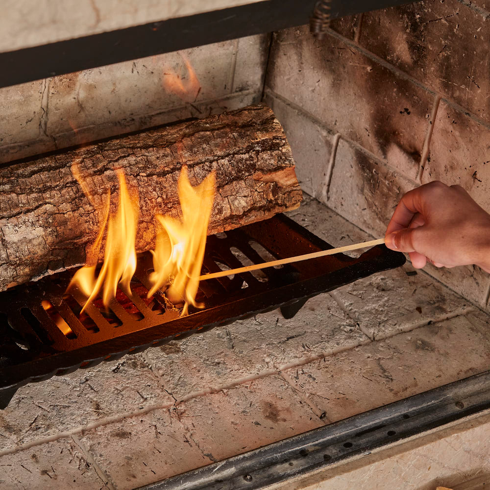 UniFlame Firestarter Tray with soapstone insert extends burn time.