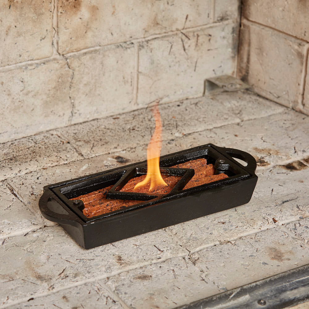 UniFlame Firestarter Tray enables lighter-fluid application for easy flame start.