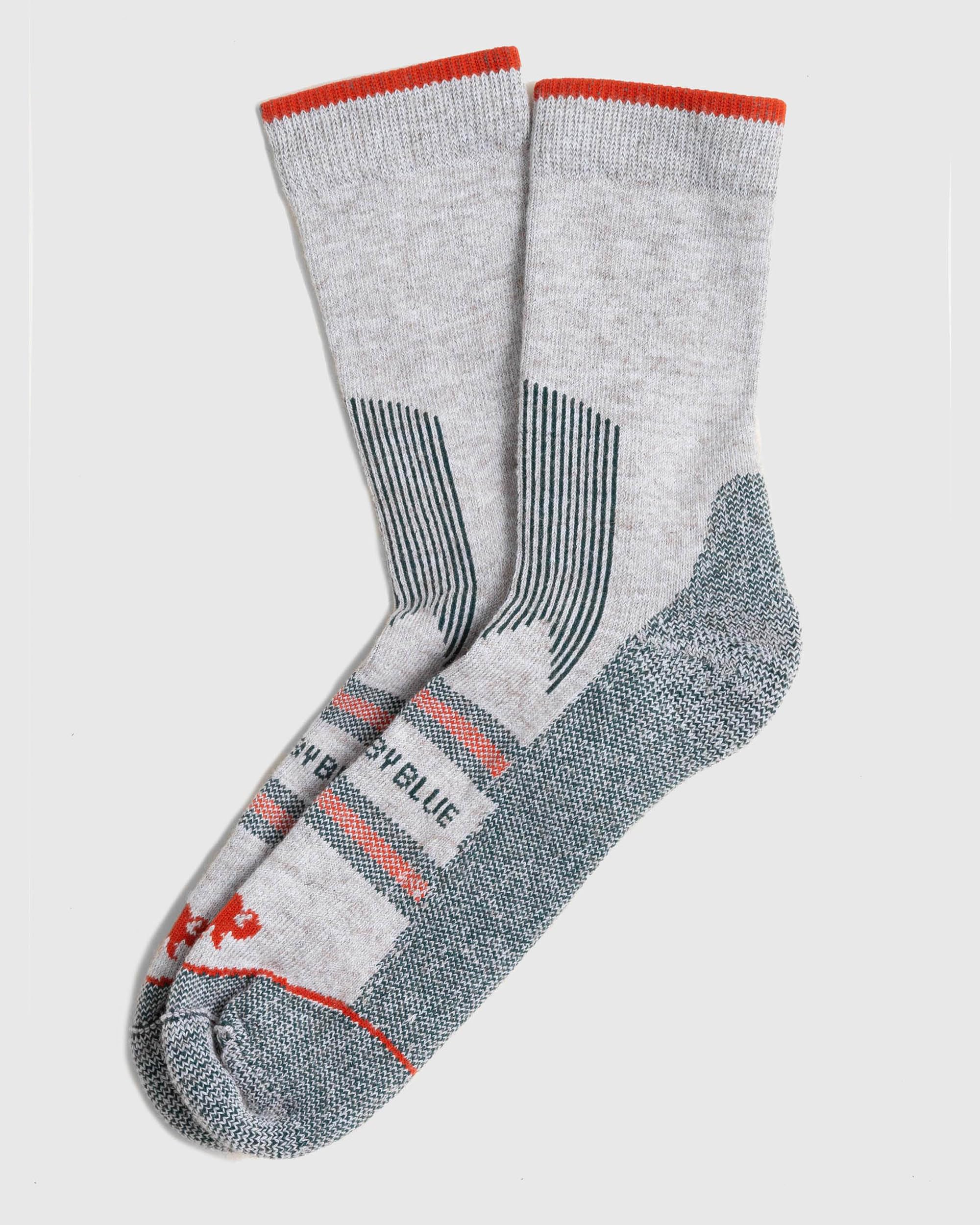 United By Blue Bison Trail Sock green packaging highlighting sustainable materials