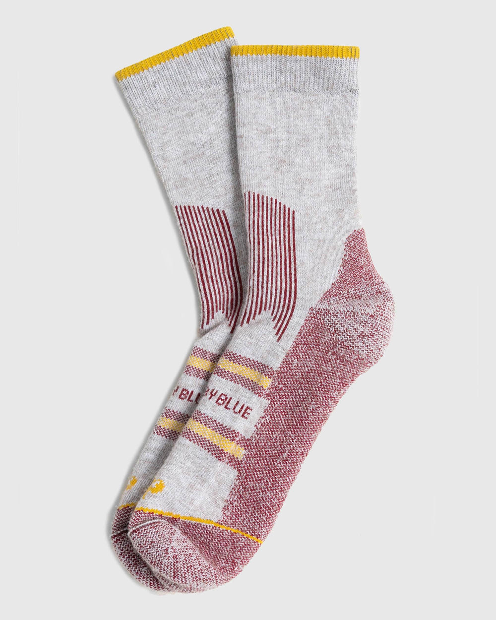 United By Blue Bison Trail Sock red model foot shows unisex sizing.