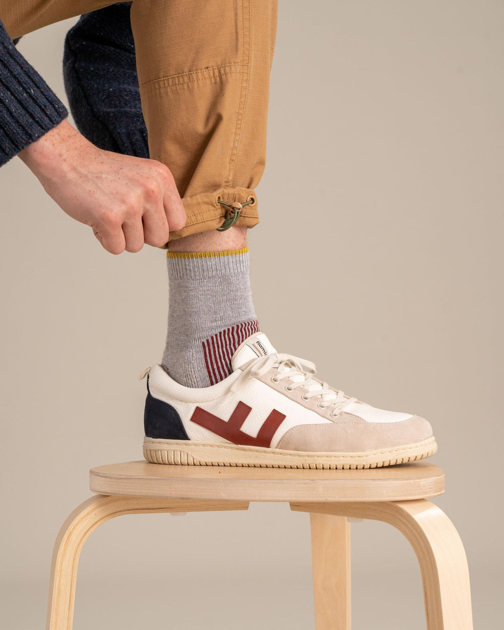 United By Blue Bison Trail Sock red reinforced heel cushion on rugged hikes.