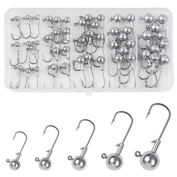 Close-up of unpainted round ball jig head with sharp hook