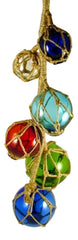 Upper Deck Japanese glass fishing float closeup with natural jute accents for nautical decor.