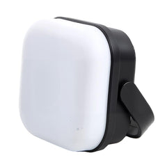 Multi-functional Mini Camping Lamp emits soft warm light for cozy campsite evenings.