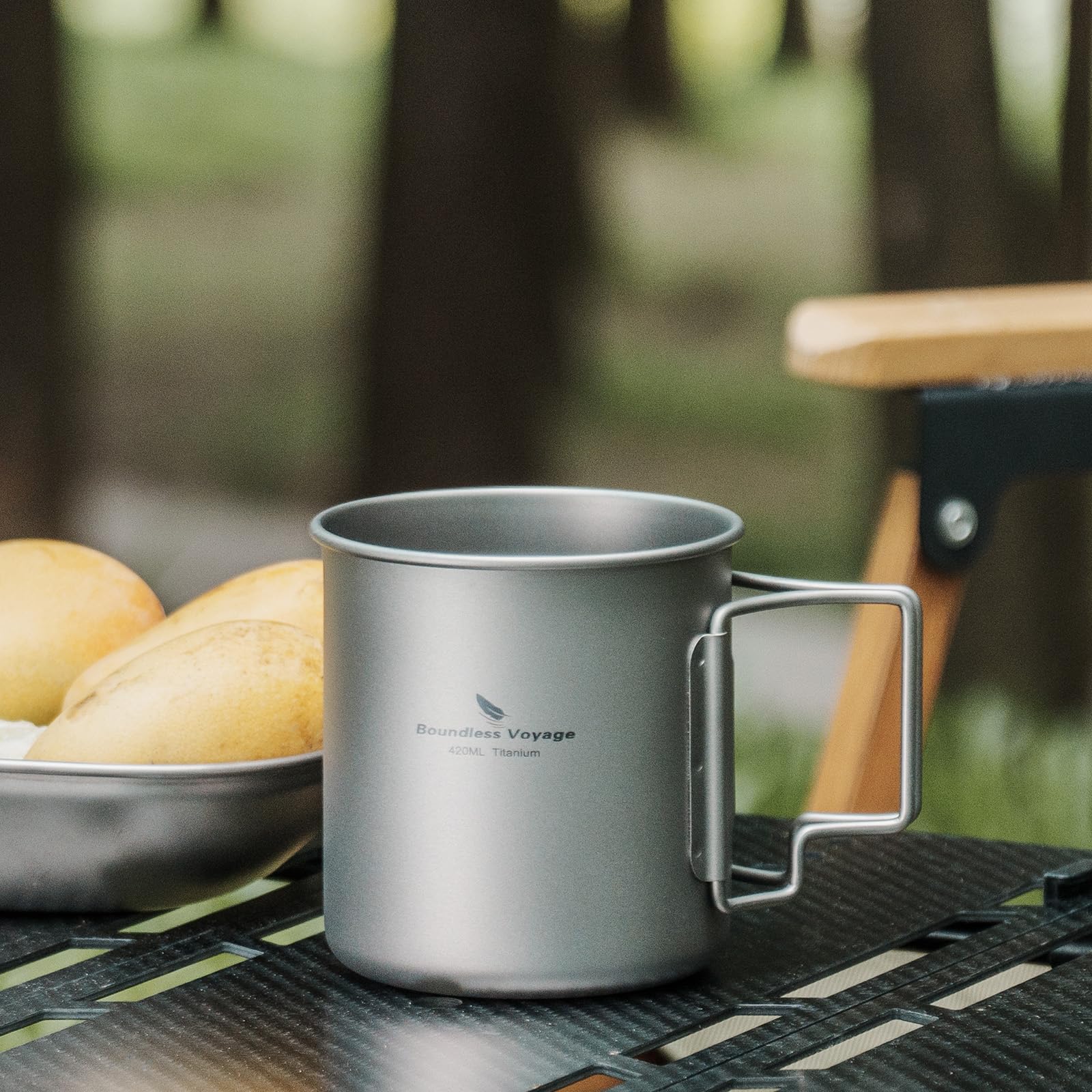 Usharedo titanium mug ready for outdoor adventures with foldable handle
