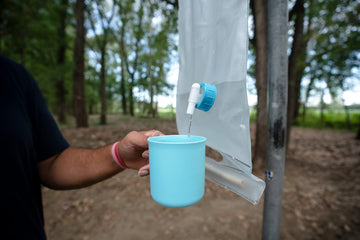 UST 10L roll-up water carrier featuring a packable design for campers.