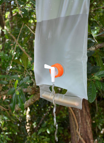 UST 10L roll-up water carrier with transparent construction for water visibility.