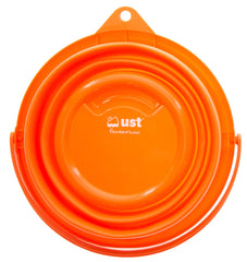 UST FlexWare Bucket collapsed for compact storage in a backpack