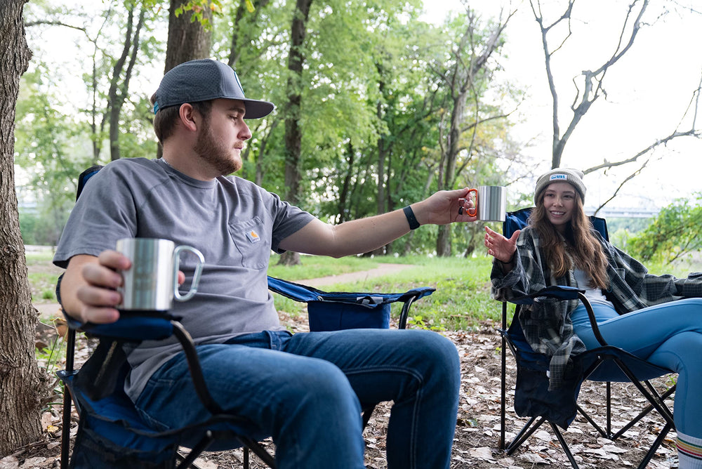 ust KLIPP Biner Mug 1.0 four-pack arranged with gear attached to a pack for outdoor use.