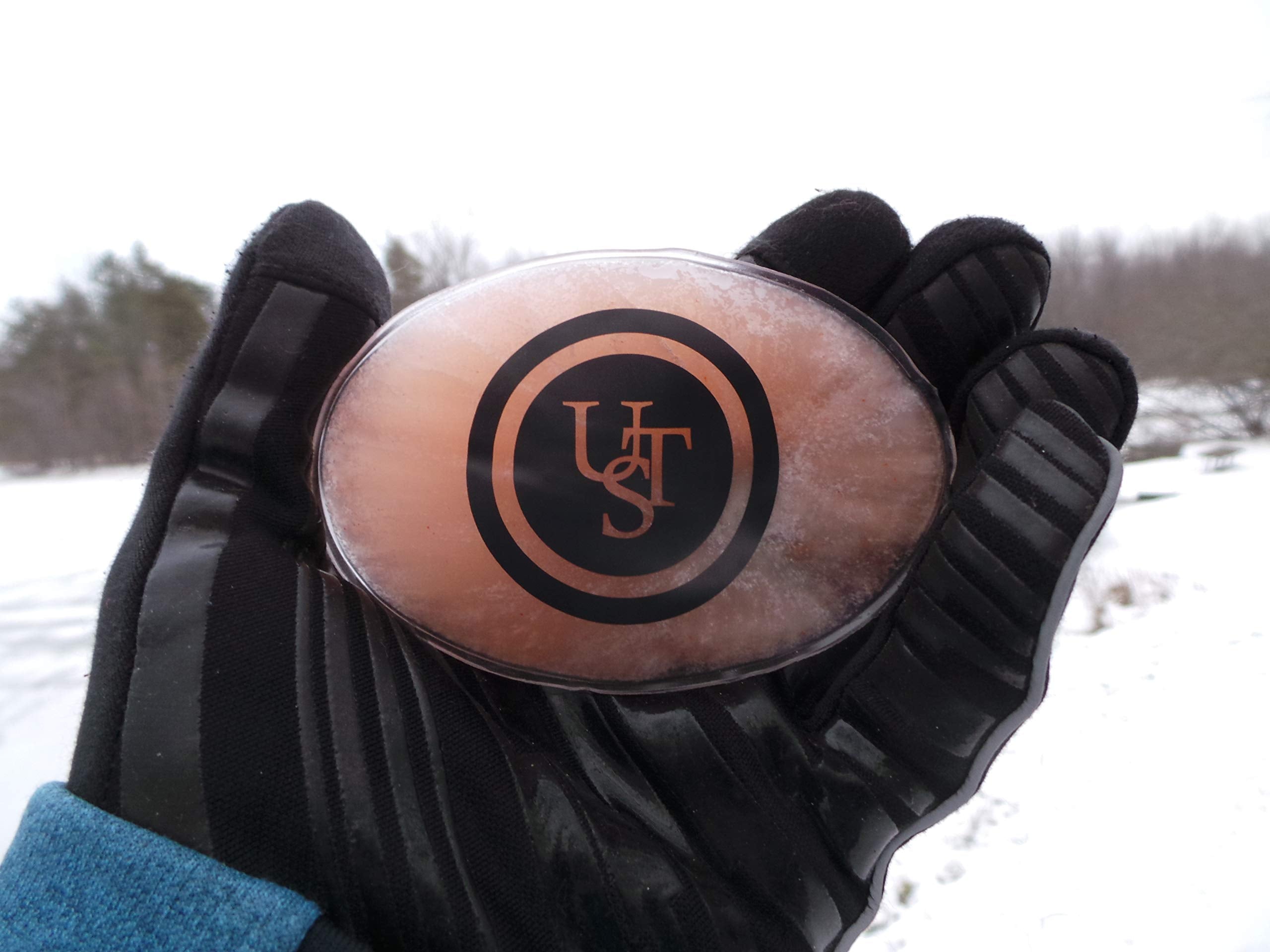 UST hand warmer activation disk ready to bend for heat