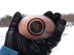 UST hand warmer activation disk ready to bend for heat