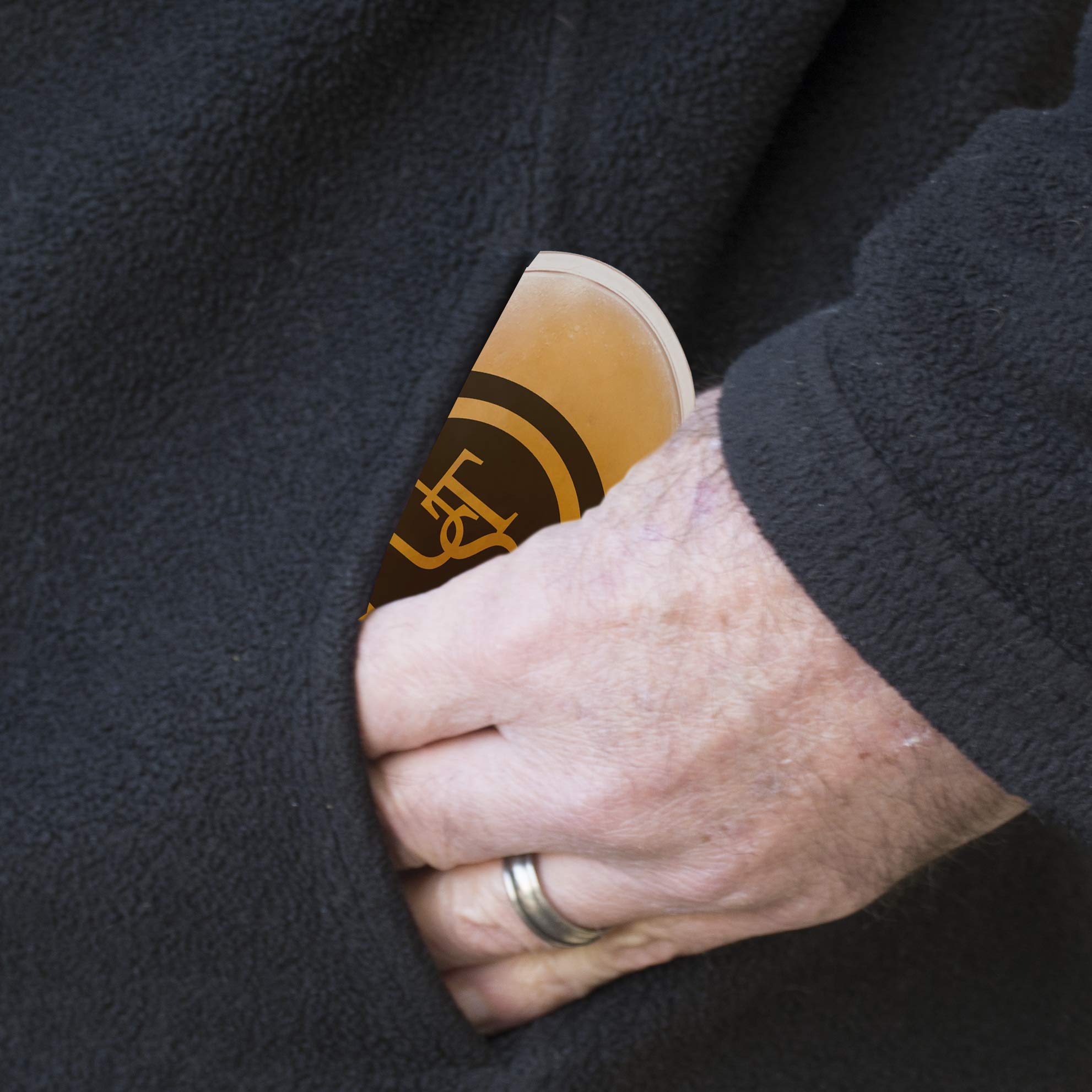 UST hand warmer in use on hands outdoors for warmth