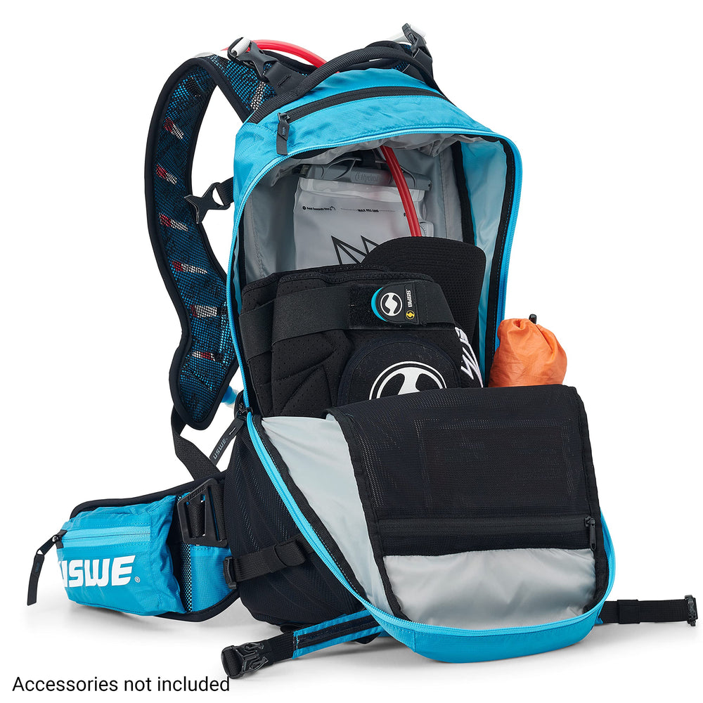USWE Shred 16L night visibility with LED attachment and reflective details