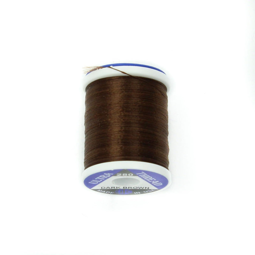 UTC Ultra Thread 280 Denier Dark Brown spool enhances grip for precise fly tying.