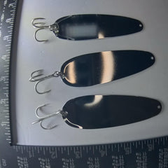 Close-up of reinforced hook and UV & Glow finish on salmon trolling spoon