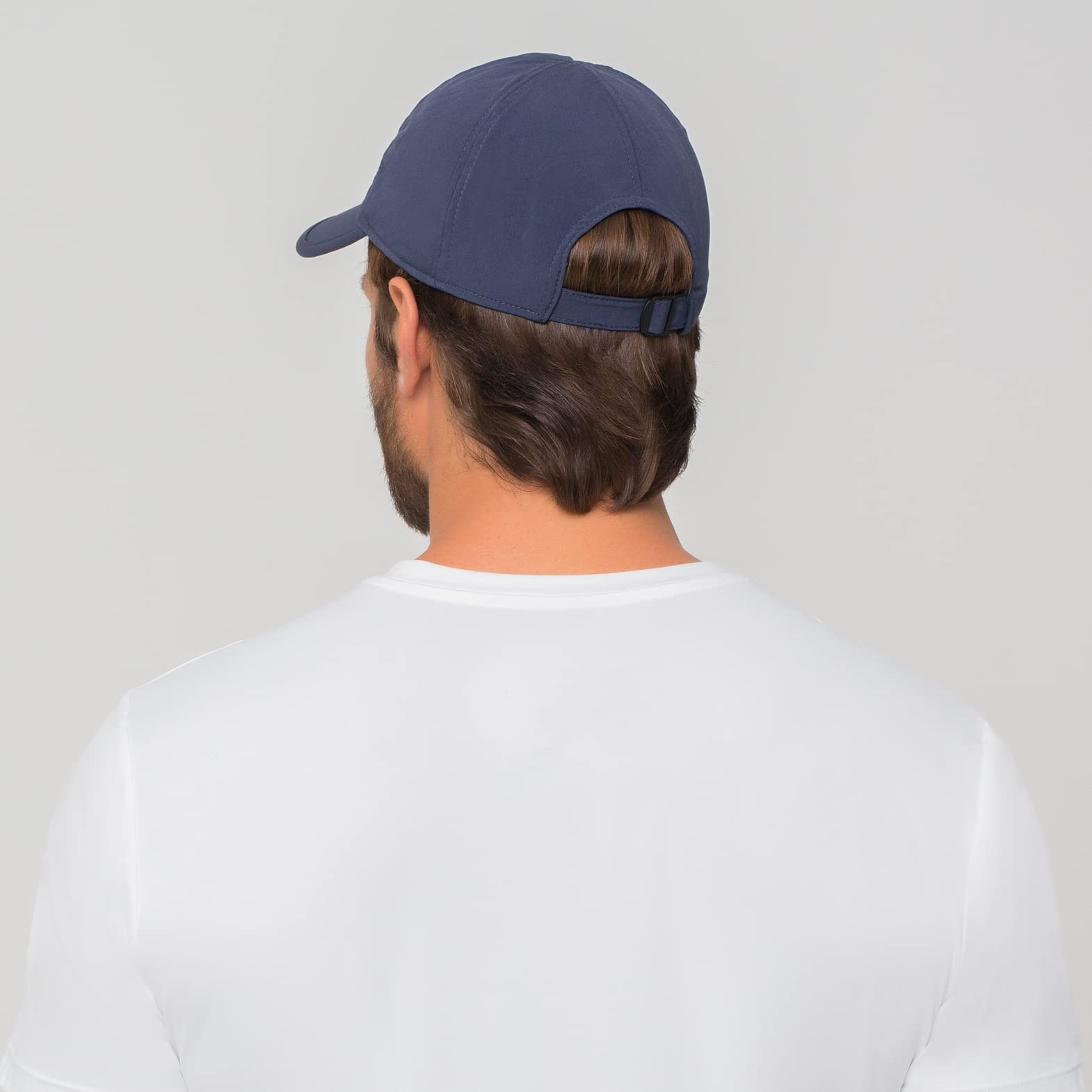 UV.LINE UV PRO Cap navy side view highlighting adjustable fit with Velcro closure