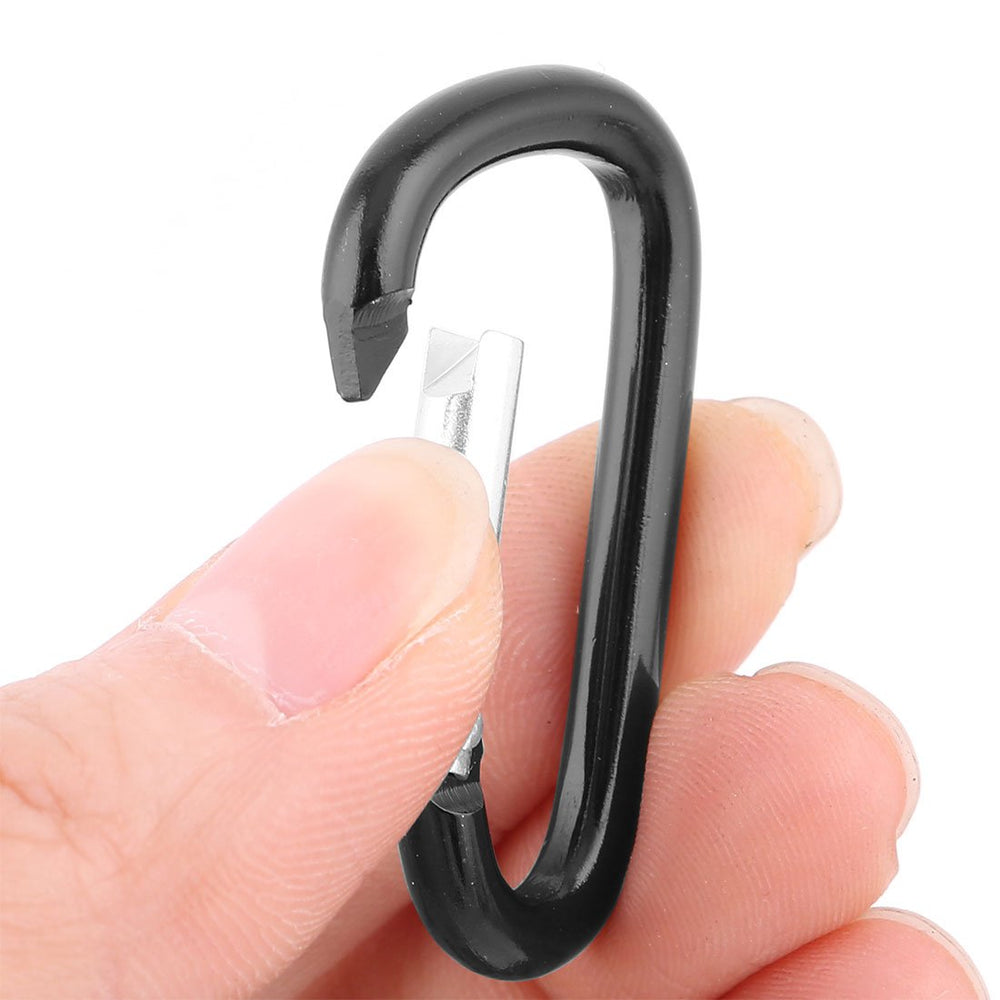 uxcell spring-gate carabiner clip shown on a backpack ready for quick access