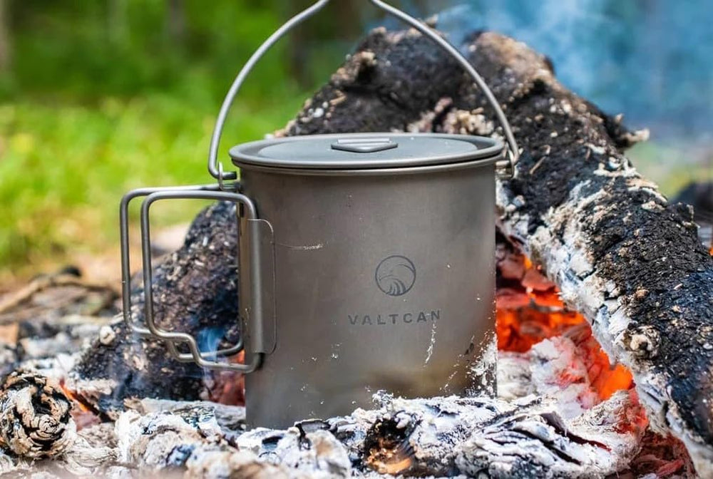 Valtcan titanium camping cup with aligned bail handle for easy drinking