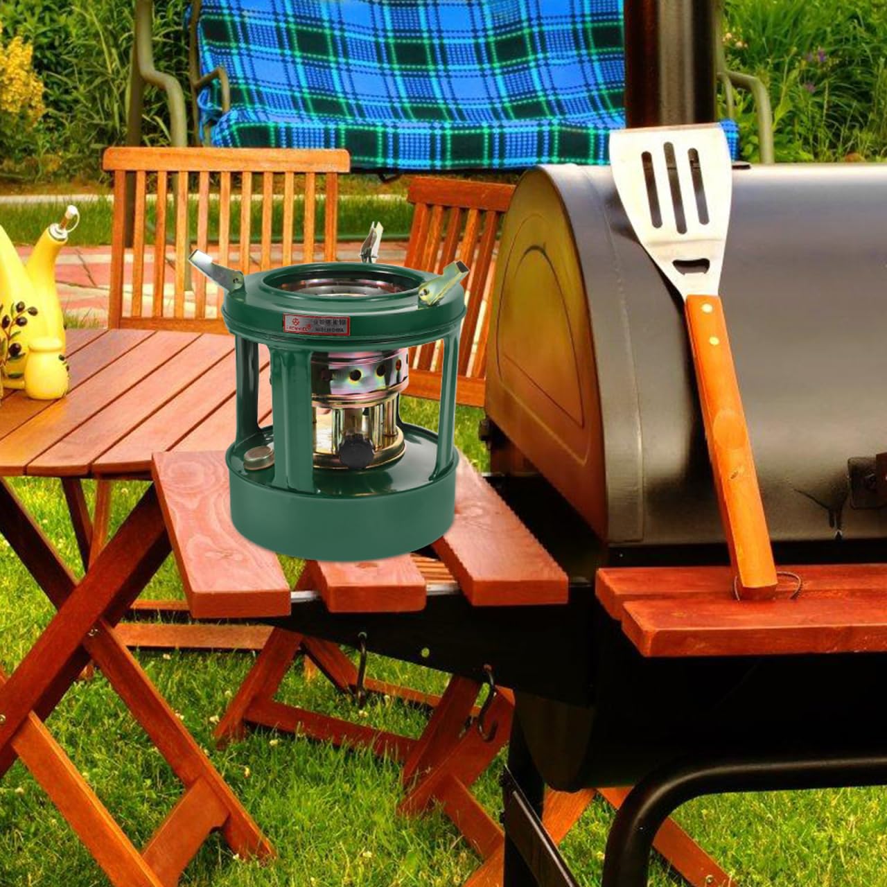 VANZACK outdoor barbecue using kerosene stove for grilling and warmth