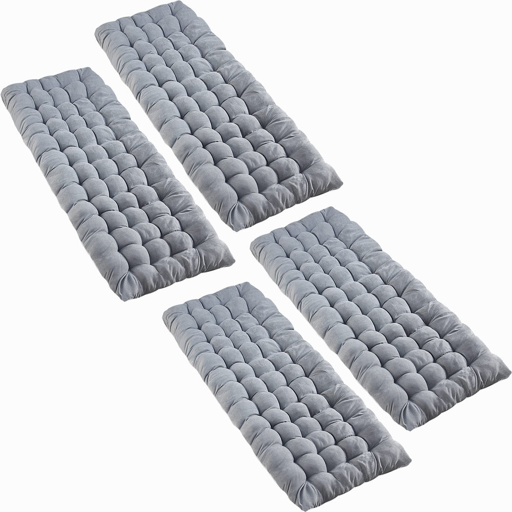 VaygWay grey outdoor cot pad on grass showing plush 3-inch cotton padding for camping comfort.