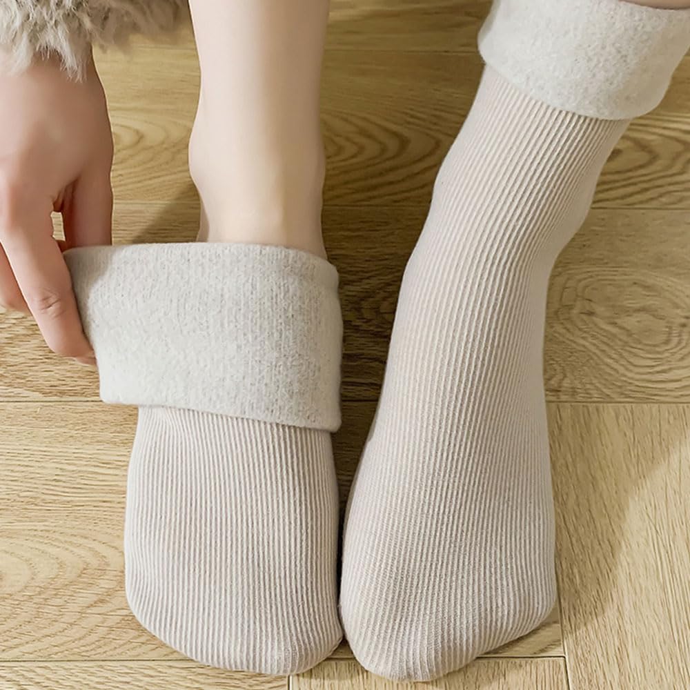 Veayiik thermal socks worn by a woman for warmth during winter.