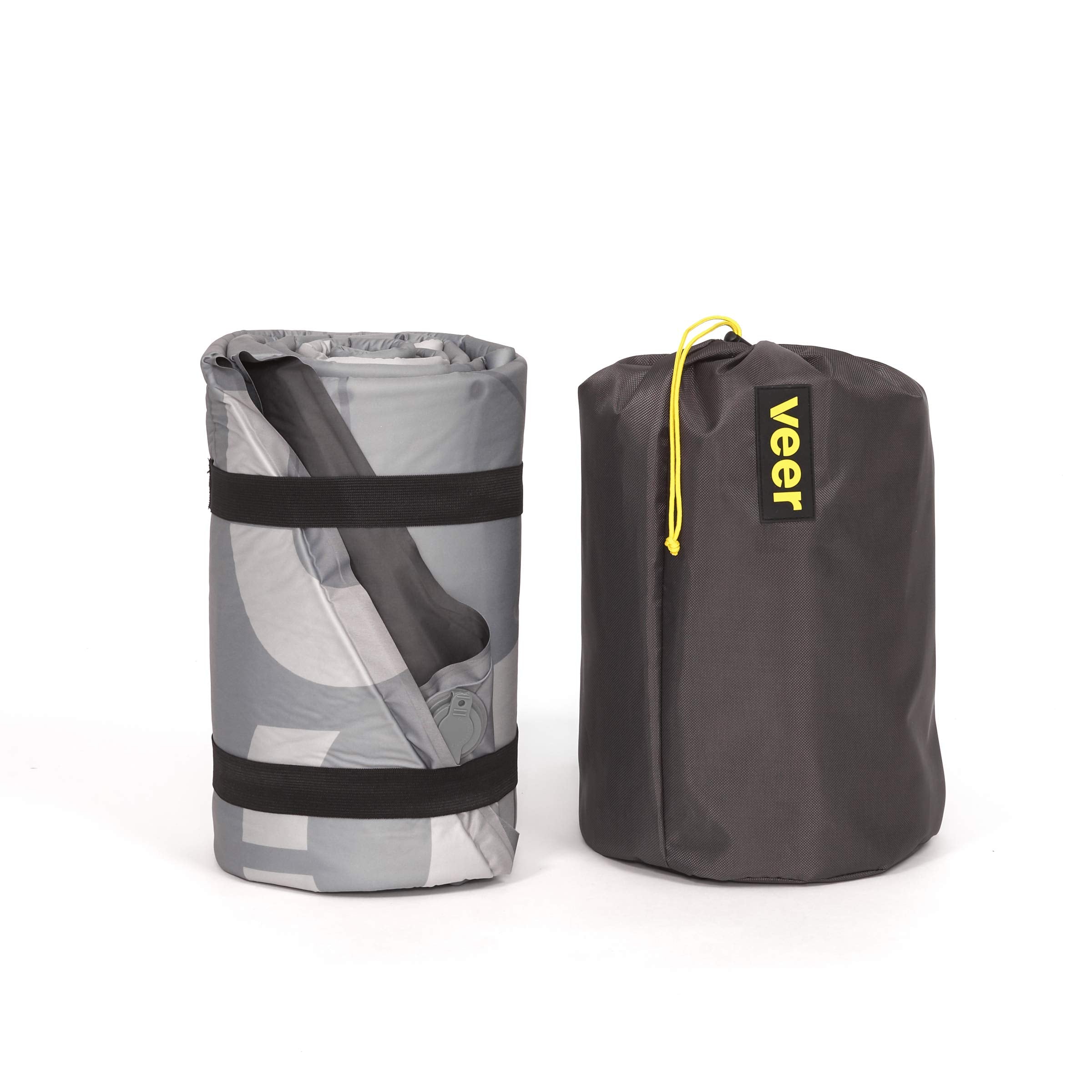 Veer Air Pad folded in storage bag demonstrates portability.