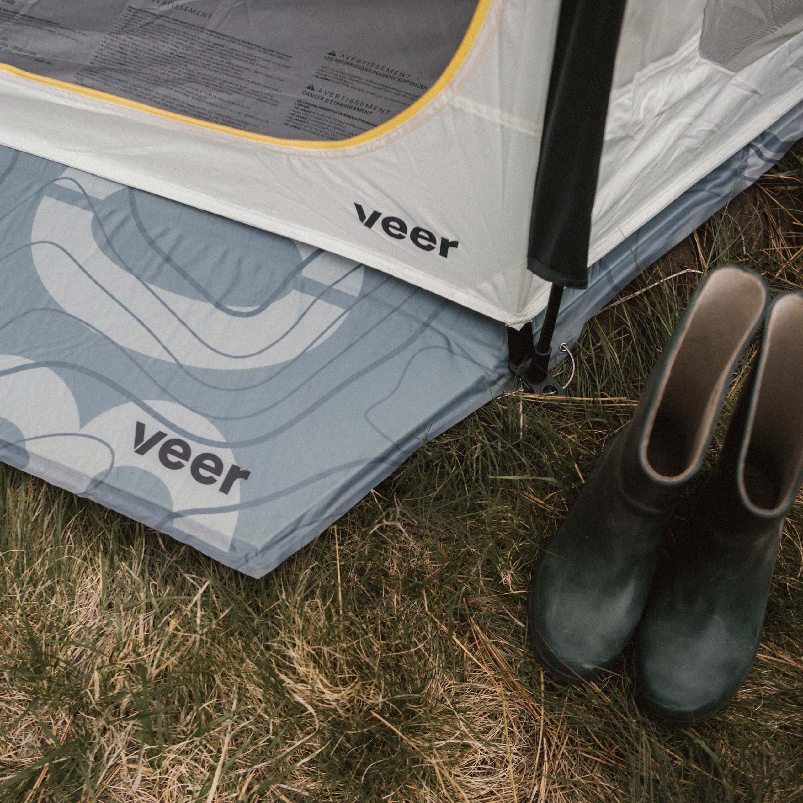 Veer Air Pad XL shows generous 62 by 68 inch footprint on uneven ground.