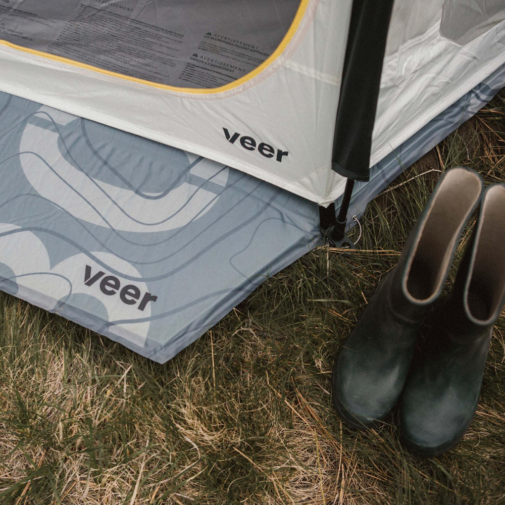 Veer Air Pad XL shows generous 62 by 68 inch footprint on uneven ground.
