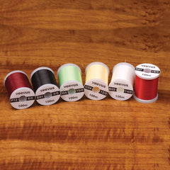 Veevus Thread spool showing vibrant color range for precise, durable fly tying.