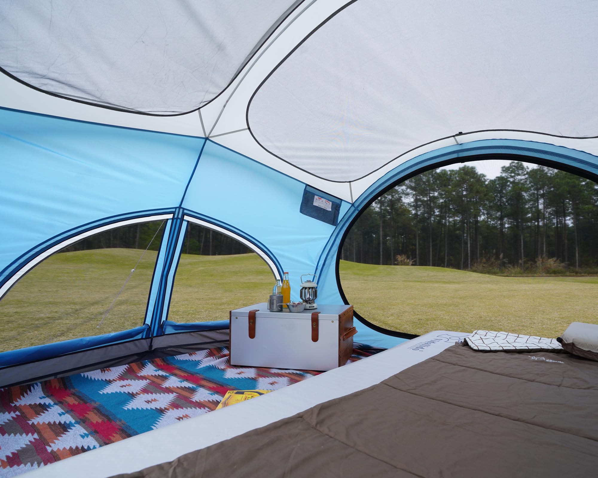 Vidalido tent with large mesh doors and windows promotes airflow and bug protection
